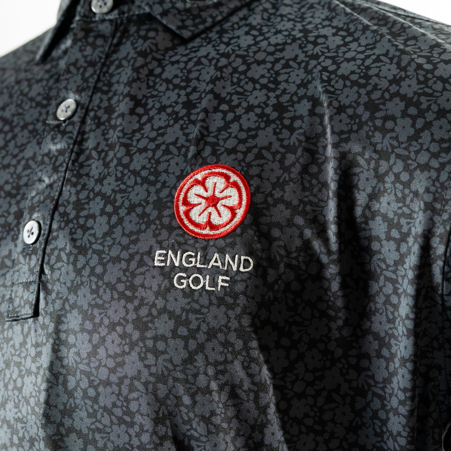 England Golf FJ ProDry Polo. Floral Lisle. Black