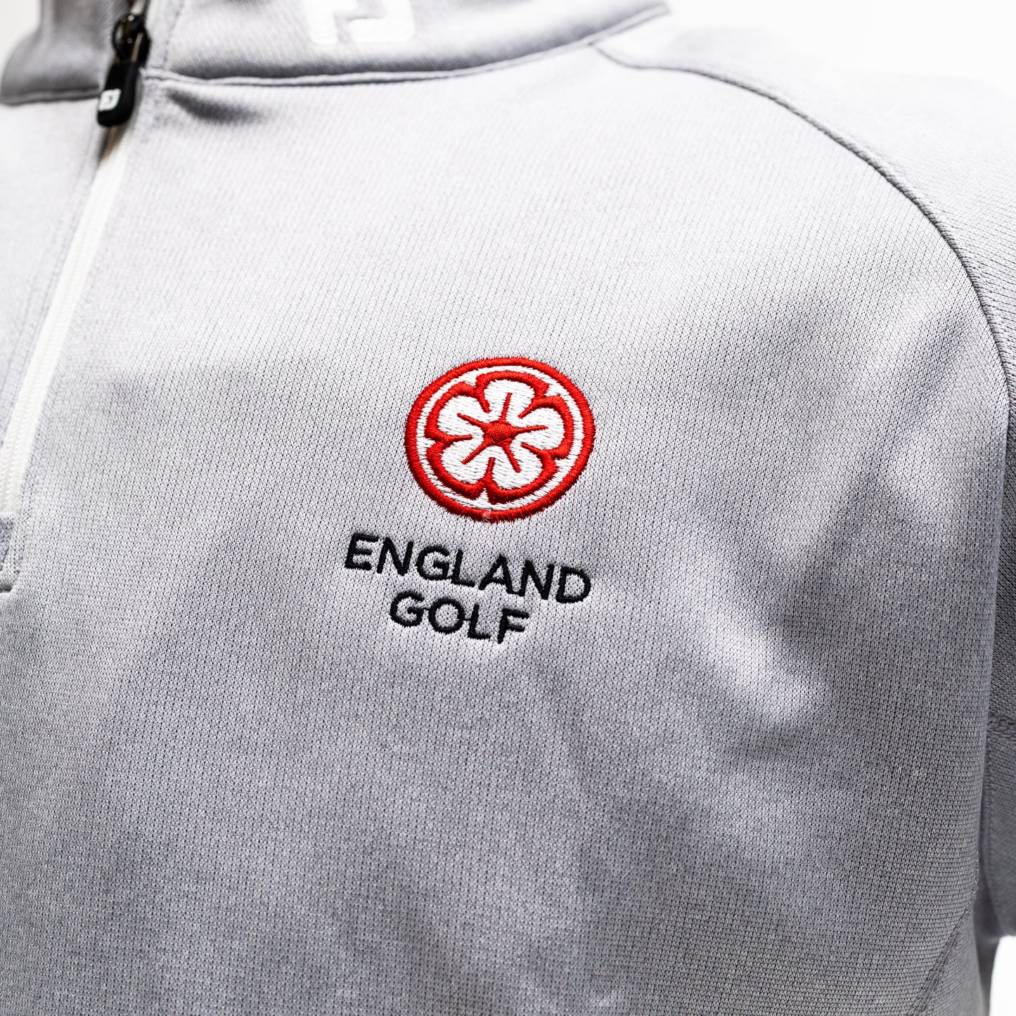 England Golf FJ 1/4 Zip Performance Pullover. Grey